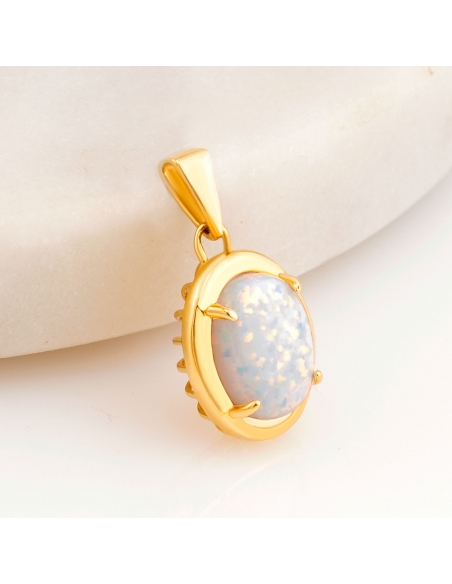 Przywieszka złota owalny opal w czterech łapach PZR1143